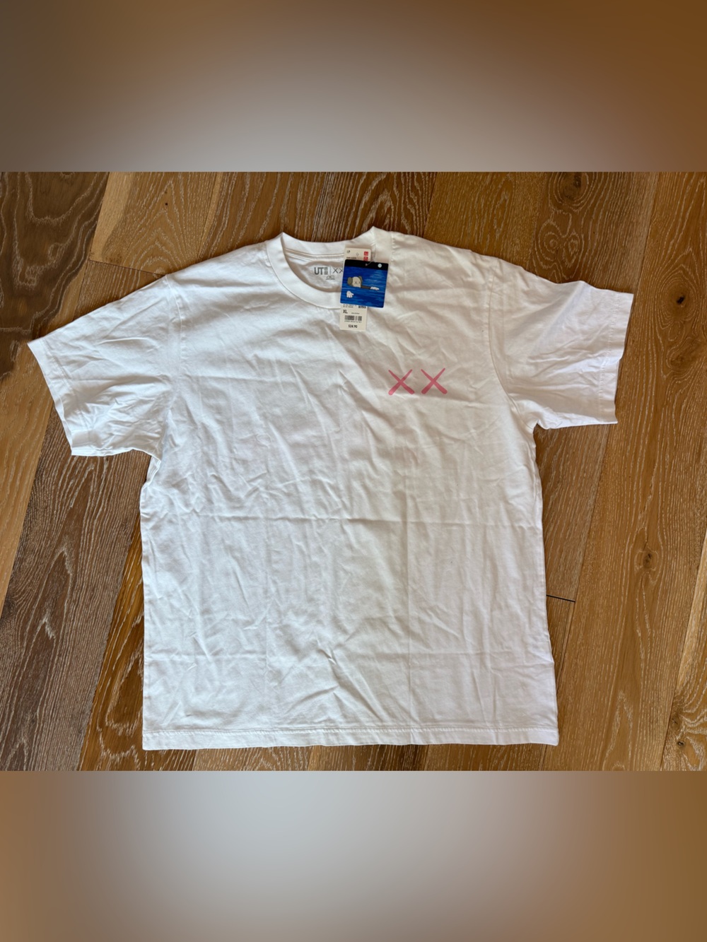 KAWS × Uniqlo UT Short Sleeve Graphic
T-shirt Size XL Pink BFF new - Picture 10 of 12